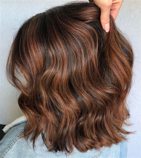 dark auburn hair with highlights